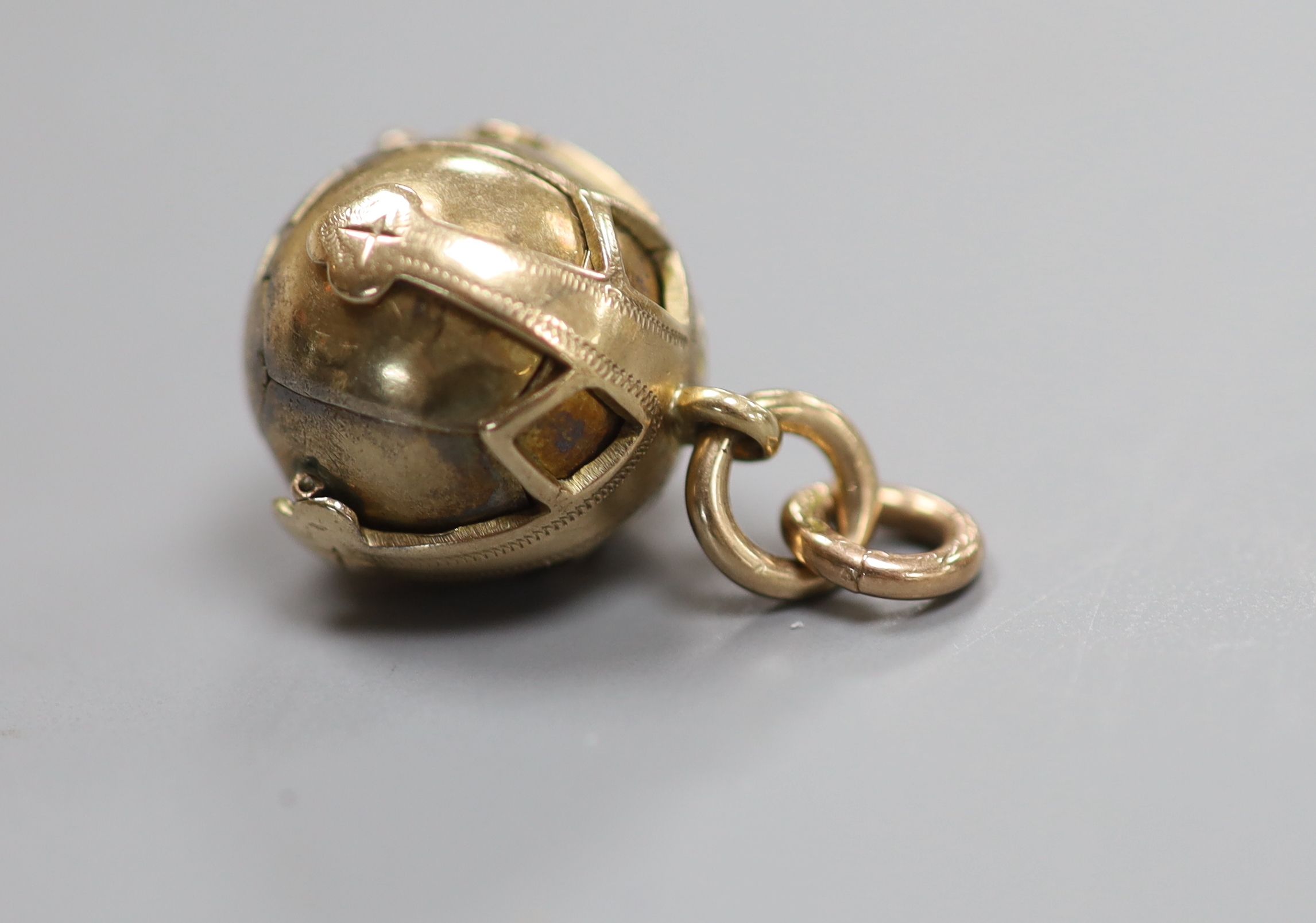 A 9ct and white metal masonic ball pendant
